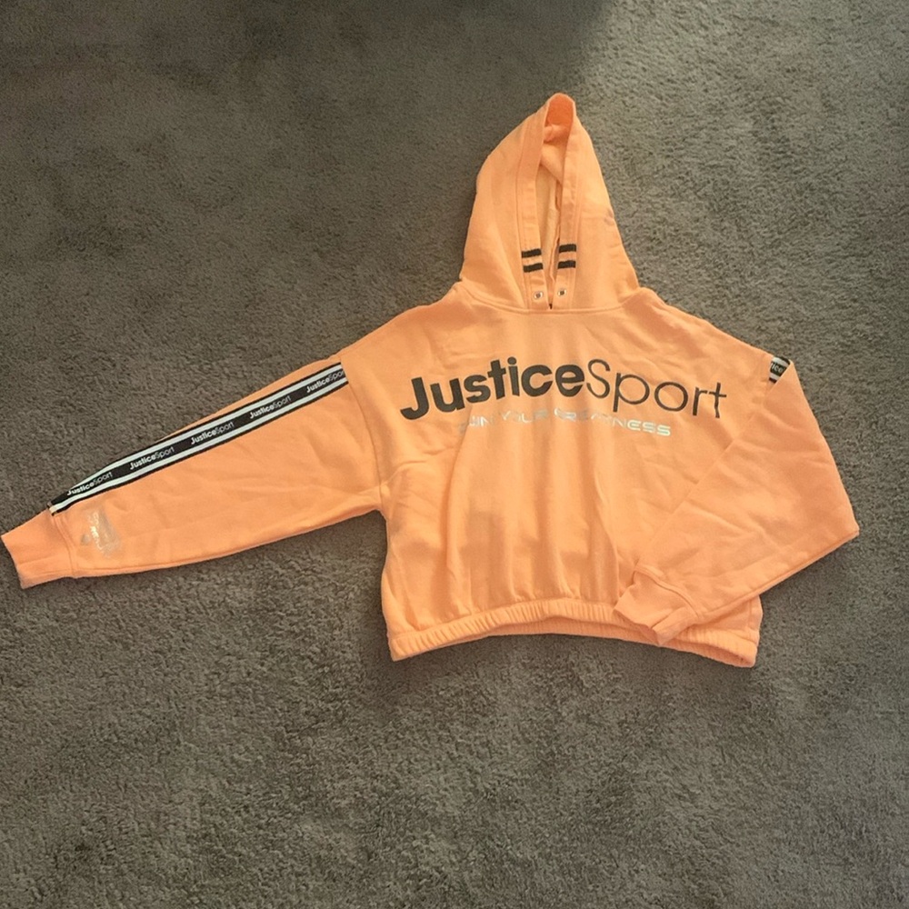 Girl’s Justice Sport size large. Neon Orange and black designs. Cropped sweater
